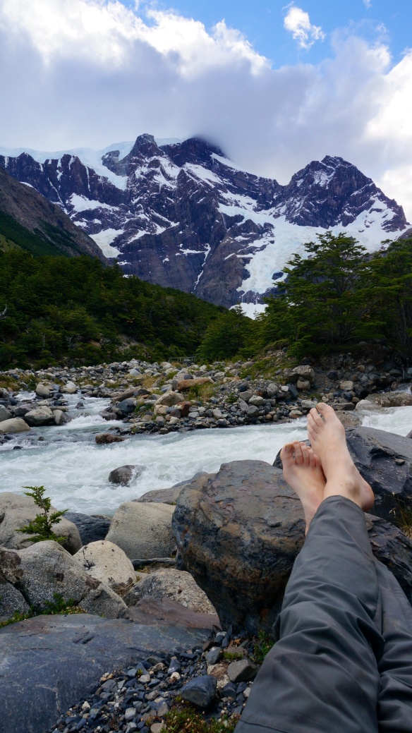 Resting our feet next to the river at Campamento Italiano. 